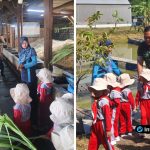 Foto : Anggota Satgas Pandu Sakti Serda Feri mengajak siswa PAUD berkeliling area pertanian terpadu