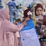 Foto : Pemberian Baliho Bukti Transfer Rp 1000 000